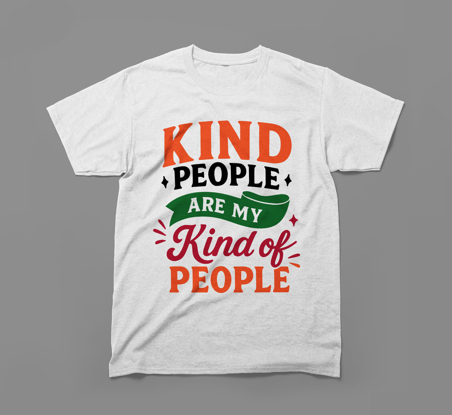 white t-shirt with colorful text print saying 'kind people are my kind of people' on gray background.