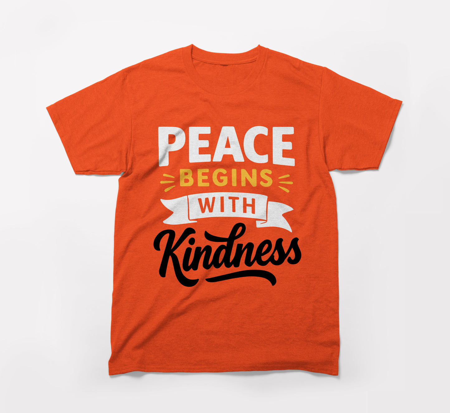 orange t-shirt with 'peace begins with kindness' message in bold white, yellow, and black text.
