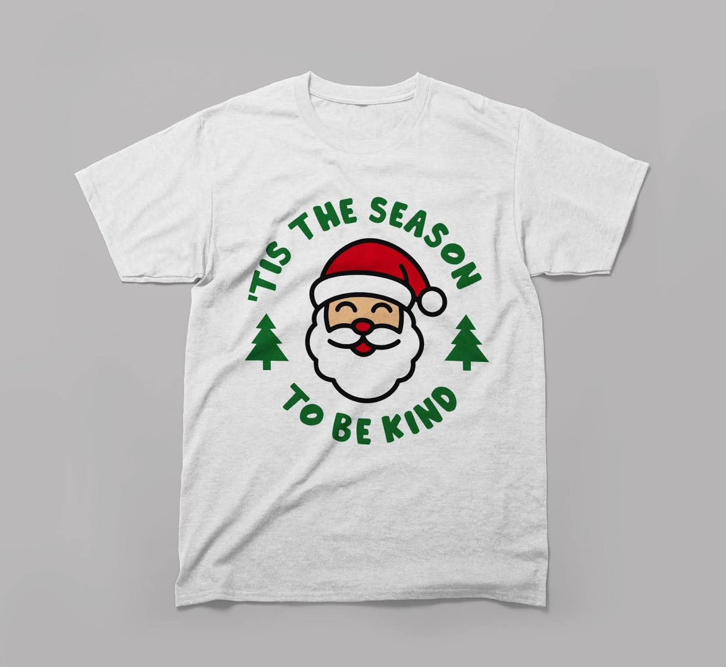 white t-shirt with smiling santa, christmas trees, and 'tis the season to be kind' text