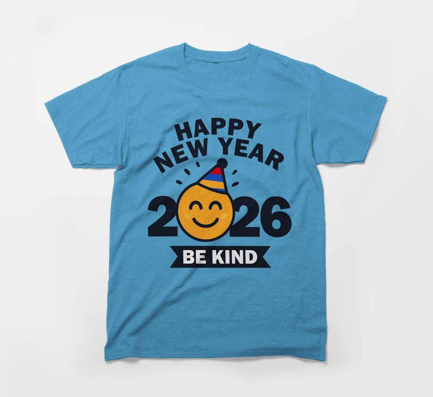 blue t-shirt with 'happy new year 2026 be kind' and smiley party emoji design.