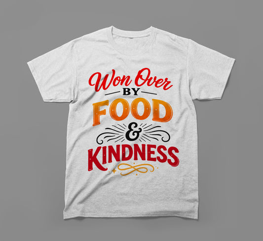 Light gray t-shirt with 'Won Over By Food & Kindness' text design in red and orange.
