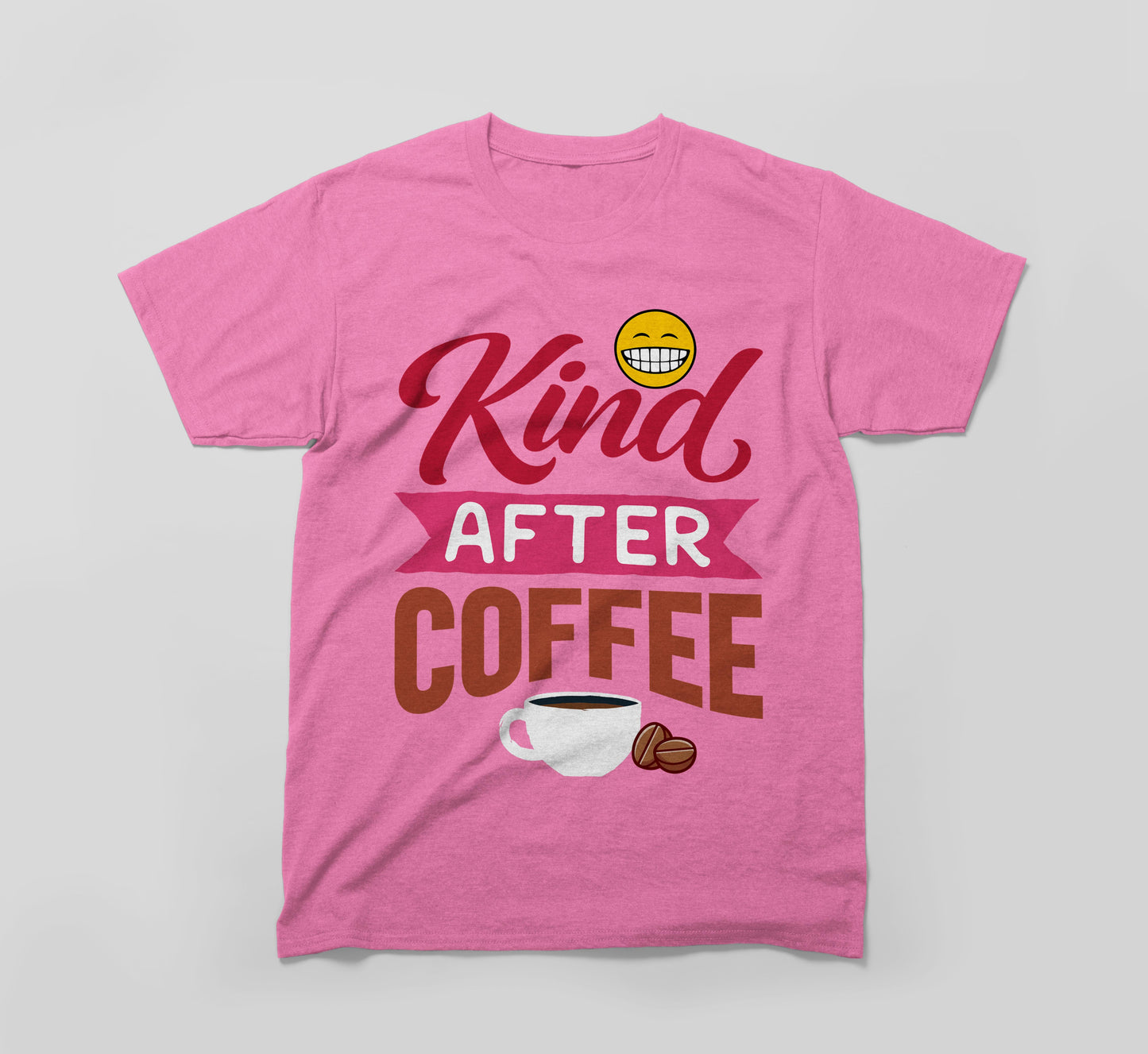 pink t-shirt with 'kind after coffee' text, smiling emoji, coffee cup and coffee beans graphic.