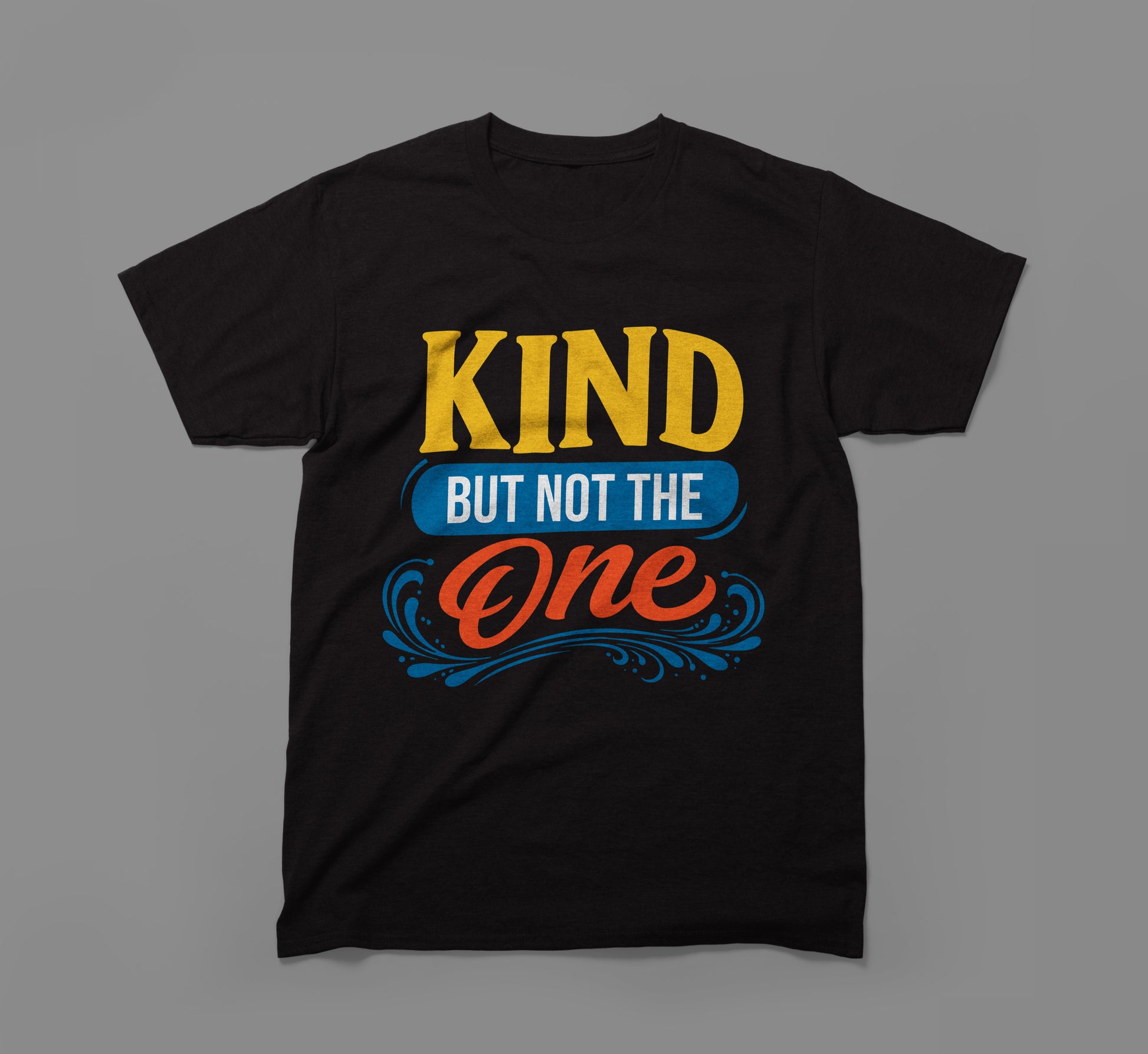Black t-shirt with bold text 'Kind but not the one' in yellow, blue, and orange lettering.