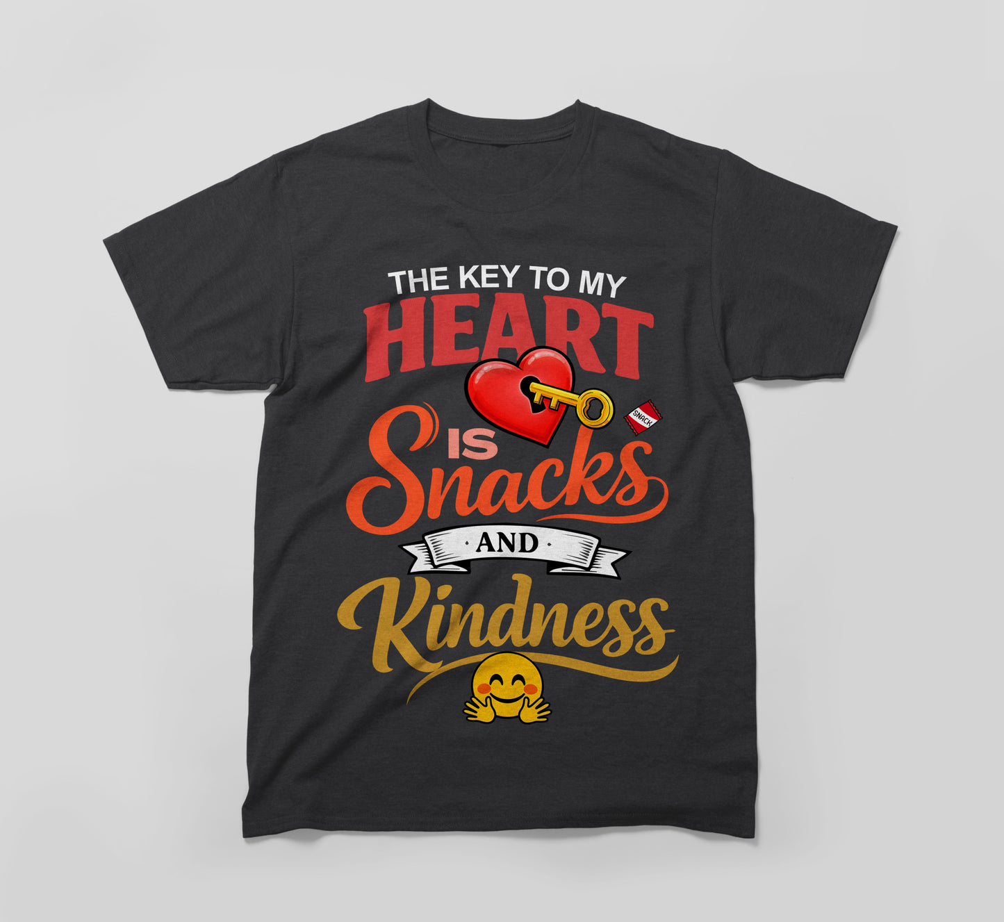 black t-shirt with 'the key to my heart is snacks and kindness' slogan, heart and emoji graphic