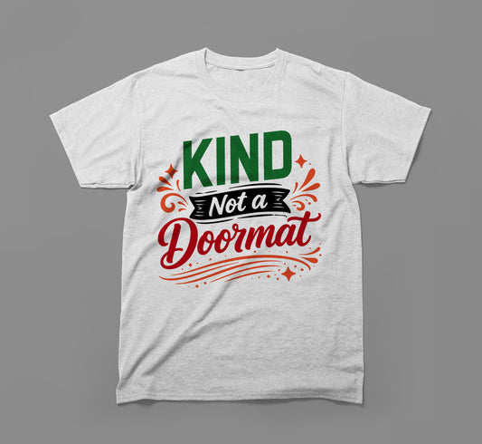 Gray t-shirt with Kind Not a Doormat motivational quote in bold, colorful lettering.