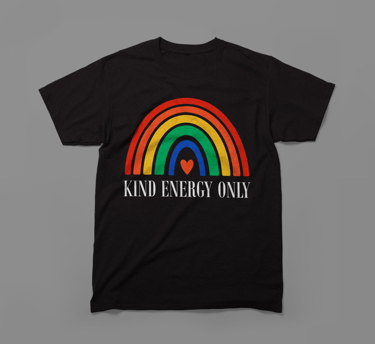 black t-shirt with rainbow graphic, red heart, and text 'kind energy only' on front