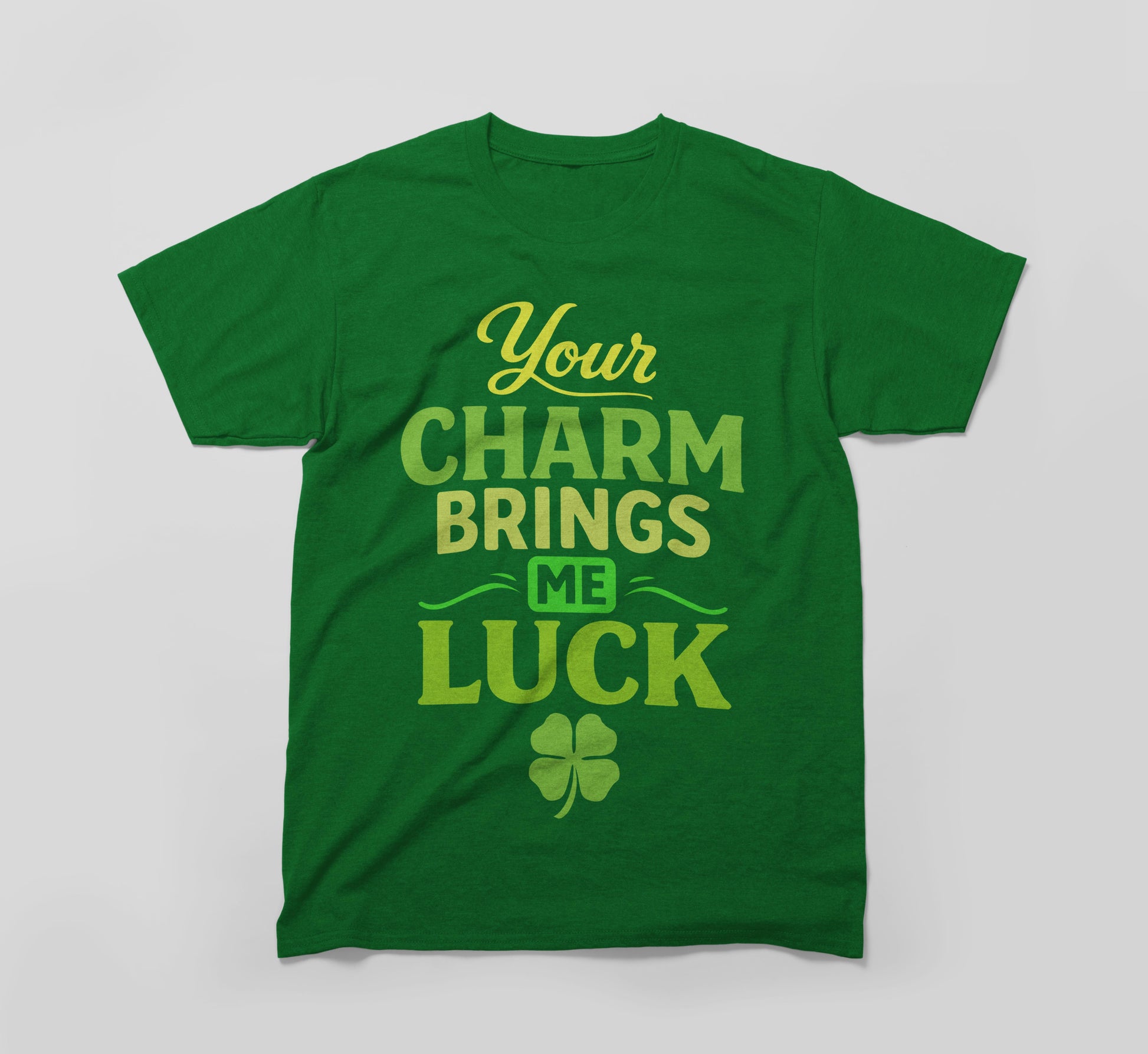 Green t-shirt with yellow and green text 'Your charm brings me luck' and a shamrock graphic