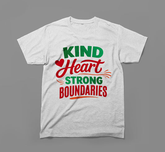 White t-shirt with inspirational text 'Kind Heart Strong Boundaries' in colorful letters