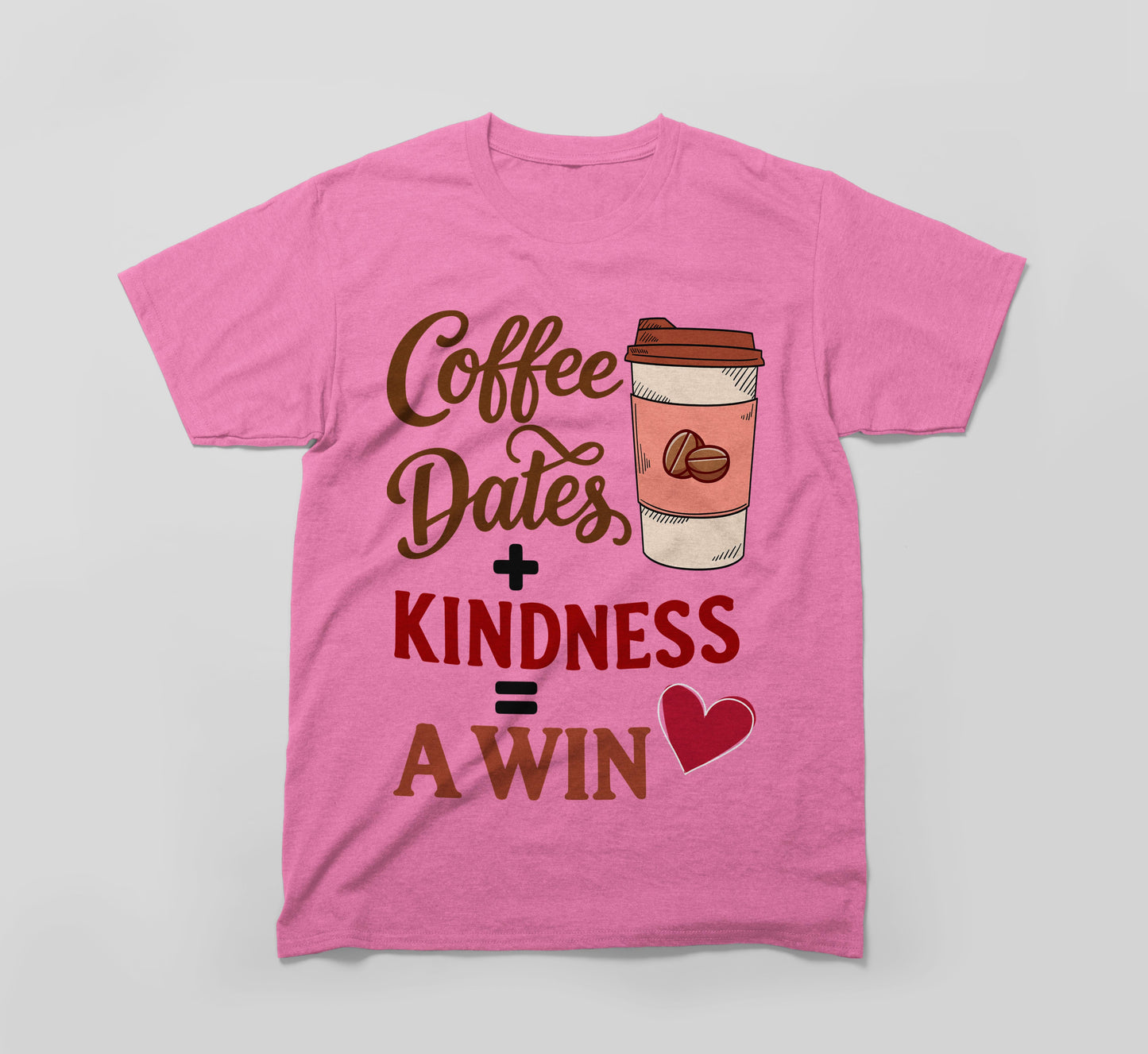 pink t-shirt with coffee cup graphic and 'coffee dates + kindness = a win' text design